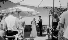 couple exchanging vows in a bilingual wedding ceremony (German-English)